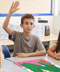 Student in classroom with 'N' from Bienvenidos Welcome Poster Set For Spanish Classrooms 11 Learning Posters 12 By 18 Inches