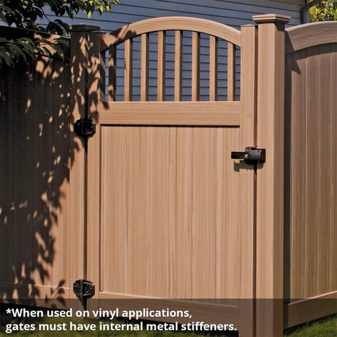 Dual Sided Lockable Magnetic Gate Latch Matte Black on a wood fence gate with vertical slats and an arched top.