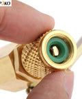 Close-up of Air Conditioning Ball Valve One Quarter Inch SAE Adapter showing brass texture and threading detail