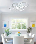 Cool 8-Ring LED Dimmable Ceiling Light With Remote, white flush mount in modern dining room with abstract art.