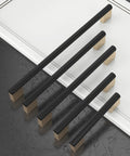 Five Inch Black And Gold Knurled Cabinet Pulls Set Of Ten Heavy Duty Drawer Handles arranged on a countertop