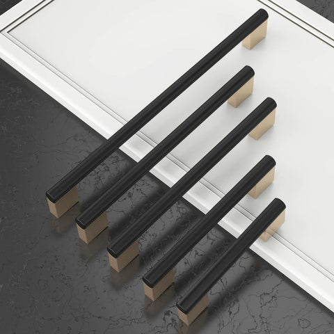 Five Inch Black And Gold Knurled Cabinet Pulls Set Of Ten Heavy Duty Drawer Handles arranged on a countertop