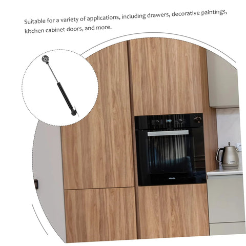 NUOBESTY cabinet lift support hinge with soft-close, black metal gas spring on wooden kitchen cabinet near built-in oven.