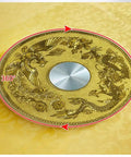 Hella Smooth 360 Swivel Tempered Glass Lazy Susan Turntable Nailed It Rotating Dining Serving Tray With Slick Golden Design surface featuring intricate gold designs.