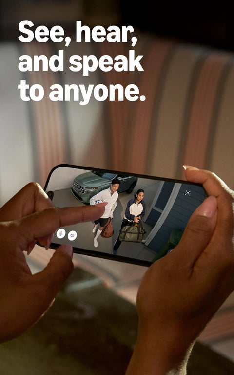 Ring Spotlight Cam Plus Battery, white security camera; smartphone displays live HD video of two people at a doorway.