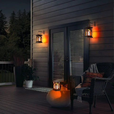 Outdoor Flickering Flame Solar Lanterns 2 Pack No Fuss Waterproof Wall Sconce Lights with 3 lighting modes on patio at night