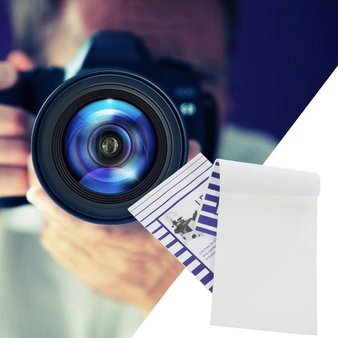 Lens cleaning paper 10x15 cm, white dry lens tissue for cameras and glasses; includes 2 booklets.