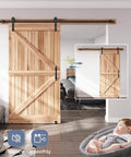 8 Ft Sliding Barn Door Hardware Kit With Straight Pulley Track For A Smooth Glide Like Butter And Quiet Operation, For 40 To 48 Inch Single Doors displayed in a living room setting with a sleeping baby nearby.