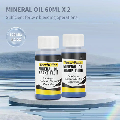 High Performance Mineral Brake Fluid 4oz for Magura hydraulic brakes, two 60ml bottles on a reflective surface.