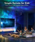 Family using Star Projector 4 in 1 Aurora Night Light With Bluetooth Speaker, Northern Lights effect in living room with dog.