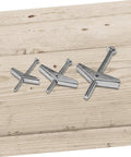 Heavy Duty Toggle Bolt Wing Nut Kit 26 Piece Set Zinc Plated Steel Drywall Anchors, three bolt sizes on wood surface