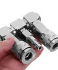 Close-up of 360 Degree Swivel 2 Way Air Hose Splitter with Nickel Plated Steel Pneumatic Fitting in hand