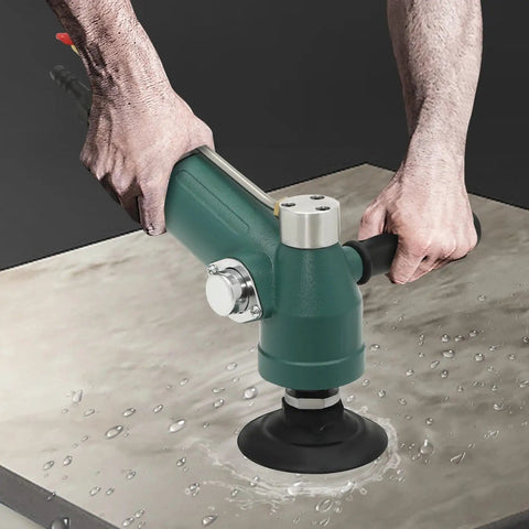 Heavy Duty Pneumatic Angle Grinder With Variable Speed And Tank Build For Stainless Steel Polishing And Granite Shaping No Fuss Hookup One Quarter Inch Air Inlet Daily Driver Shop Workhorse Tool in action on wet granite surface.