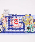Ultimate STEM Electronics Kit For Kids Ages 8 And Up With 999 Projects In One Mega Circuit Set Includes 64 Components And Full Color Step By Step Manuals For Hands On Experiments Without Soldering Learn Physics And Electronics At Home assembled circuit board with batteries and fan