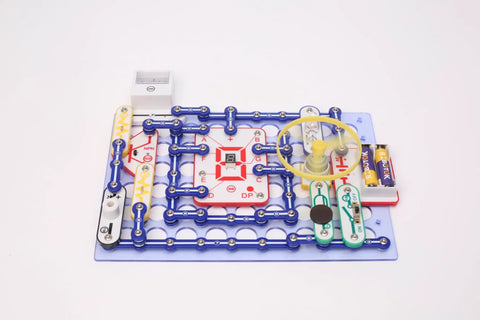 Ultimate STEM Electronics Kit For Kids Ages 8 And Up With 999 Projects In One Mega Circuit Set Includes 64 Components And Full Color Step By Step Manuals For Hands On Experiments Without Soldering Learn Physics And Electronics At Home assembled circuit board with batteries and fan