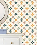 Top Tier Geometric Retro Peel And Stick Wallpaper For Your Space Refresh Skip The Drill With Easy Peasy Self Adhesive Removable Wallcovering That Hits Great On Any Wall with vibrant geometric design beside a mirror and drawer.