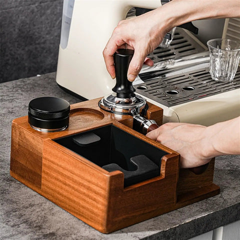 Heavy Duty Solid Walnut Espresso Tamper Station with Integrated Knock Box in use, showcasing 58 Mm portafilter setup.