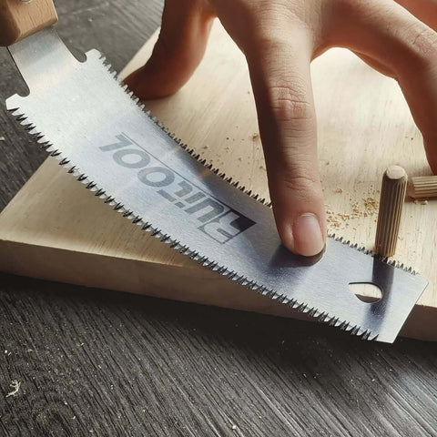 RUITOOL 6-inch double-edge Ryoba pull saw with beech handle cutting wood.