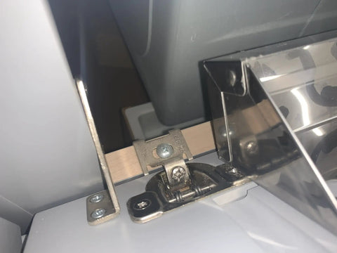 Close-up of installed Two Pack Tilt Out Drawer Hinges Kit One Eighth Inch Overlay For False Fronts And Pull Out Trays, cabinet hardware