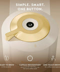 Top view of Vertuo Next Coffee And Espresso Maker By DeLonghi In Creamy White With Gold lid showing one-button operation features