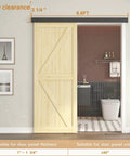 Wooden door installed with 6.6Ft Sliding Barn Door Hardware Kit With Low Clearance Aluminum Alloy Box Rail Interior Track Quiet Rollers And Shock Absorbers For A Smooth Noiseless Sliding Experience Easy To Install Black Finish For Home And Office
