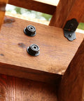 Close-up of Ten Pack 2 Inch Decorative Angle Rafter Clips With Sunset Powder Coated Finish For Pergola Deck And Fence, showing installation on wood.