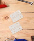 Two Sets of Mini Acrylic Hinges for Wooden Boxes and Crafts on wooden table with tools, easy install, durable kitchen cupboard hardware