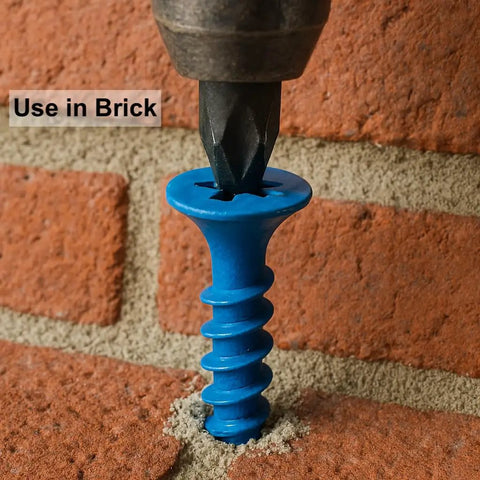 Screwdriver inserting a screw into brick showing 100 Pack Three Sixteenth Inch By One And Three Quarter Inch Flat Head Phillips Diamond Tip Concrete Screws For Anchoring Masonry Block And Brick With EnviroSeal Blue Coating And Deep Threads For Superior Holding Power