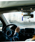 Interior of a car showing view from front seat with snap rivets from Headliner Repair Kit For Cars With Snap Roof Rivets, Easy Interior Ceiling Fix And Quick Installation For Detached Roof Repair, Compatible With A Wide Range Of Vehicle Models, DIY Friendly visible on ceiling.