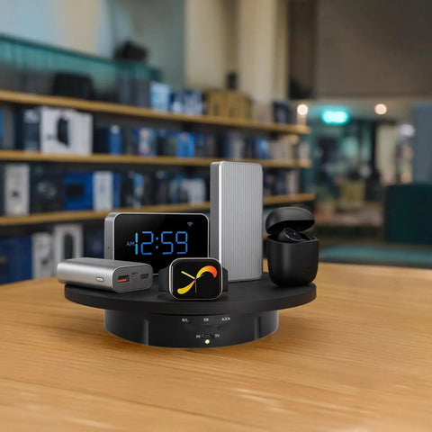 Kick Start Your Sales With This Premium Electric Turntable Motorized Display Stand featuring various tech gadgets on display.