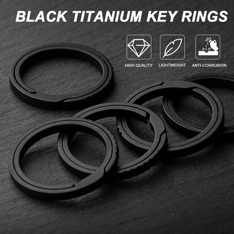 Black Titanium Key Ring With Innovative Side Push Pump Design, Heavy Duty Keychain Accessory, shown in 2 pack on dark surface