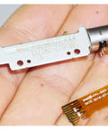 Person holding a DC 5V 30mm Linear Actuator 8mm Stroke 2 Phase 4 Wire Precision Stepper Motor with screw drive slider nut.