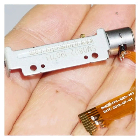 Person holding a DC 5V 30mm Linear Actuator 8mm Stroke 2 Phase 4 Wire Precision Stepper Motor with screw drive slider nut.