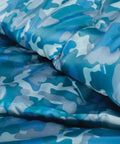 Blue camo fabric of Kids 45F Sleeping Bag For Kids Up To 5 Ft 5 In Tall, Lightweight Warm Sleep Sack For Indoor Outdoor Use