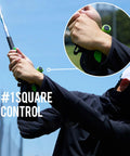 Golfer using Pro Grade Golf Swing Mechanics Tool And Analyzer For Consistent Output Indoor Outdoor, showing grip adjustment.