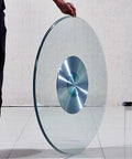 Person holding Tempered Glass Lazy Susan Turntable For Dining Tables A Game Changer Glass Lazy Susan For Family Dinners And Birthday Parties Smooth Rotation Explosion Proof High Temp Resistant Easy To Clean Safe Edges And Versatile Table Accessory