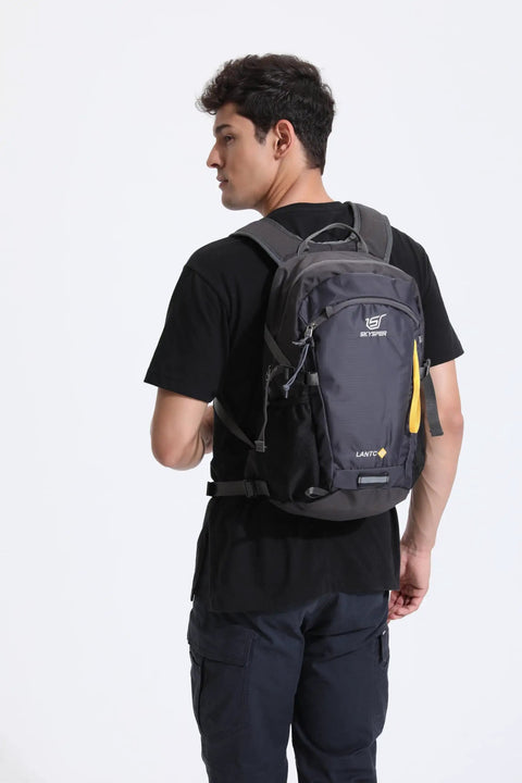 Person wearing 20L Lightweight Hiking Backpack for Men and Women, Daypack for Travel and Outdoor Adventures, Durable 600D Polyester