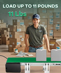 Man standing by Desktop Belt Conveyor 20 Inch With Reverse Switch And Stepless Speed Control For Packaging, boxes in background