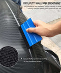 Mandark blue plastic squeegee tool for car window tinting, part of an 18-piece tint kit