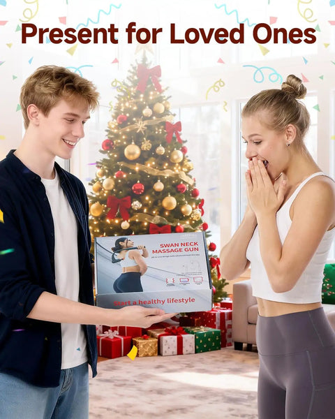 Man gifting woman a massage gun box near Christmas tree