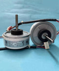 Two 20W Brushless DC Air Conditioning Fan Motors For WZDK20-38G ZKFP-20-8-6 OEM Replacement against blue background