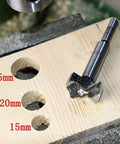 Five Piece Forstner Drill Bit Set Featuring Adjustable Depth Range, showing 15mm, 20mm, 25mm holes in wood with carbide bit.