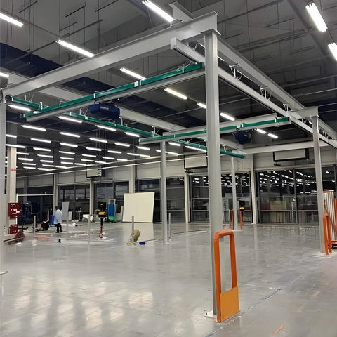 Industrial setup with overhead tracks for Four Wheel Hoist Trolley For Unistrut 1-5/8 Inch Or Taller Channel With M10 Bolt And Lifting Eye Nuts