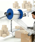 No Sweat Wall Mounted Bubble Wrap Dispenser And Foam Cushion Roll Holder in use with bubble wrap for packaging boxes.