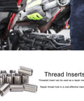 QANYEGN 10Pcs stainless steel thread inserts with sleeves; metal repair hardware components, workshop background.