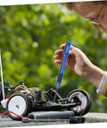Child using All In One Pro Grade RC Car Screw Tool Kit With Nuts Bolts Fasteners Gasket Repair Tools In A Durable Accessory Box