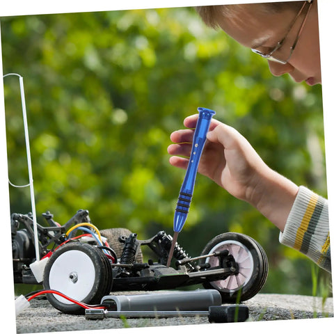 Child using All In One Pro Grade RC Car Screw Tool Kit With Nuts Bolts Fasteners Gasket Repair Tools In A Durable Accessory Box