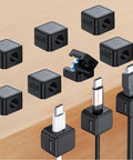 Magnetic Cable Organizer Kit 10 Pack For Desk Home And Office Must Have Adhesive Cable Clips Wire Keeper, black cubes on wood surface