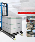 Portable Heavy Duty Mobile Lift Platform For Ventilation Duct Install And Brick Handling With Casters Raising Materials Up To 10 Feet. Heavy lift unit with materials loaded.
