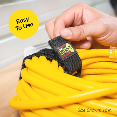 Hand securing yellow extension cord with Stretchy Elastic Cinch Straps For Quick Organization 12 Inch Wrap It Storage Straps